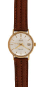OMEGA "Seamaster De Ville" automatic gents wristwatch in 18ct solid gold case with date window and baton numerals, housed in an Omega box, ​​​​​​​3.6cm wide including crown