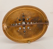 An antique 18ct yellow gold and blue enamel oval brooch, impressively adorned with old fashioned rose cut diamonds in starburst design, mid 19th century, ​​​​​​​4.7cm wide, 14.5 grams total weight - 2