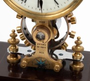 EUREKA CLOCK Co. LIMITED of London antique electric four glass library clock with dual ball bearing temperature compensated balance, white glass enamel dial with Roman numerals, (Number 8028, Patent No. 14614, 1906), 34cm high, 21cm wide, 17.5cm deep. - 3
