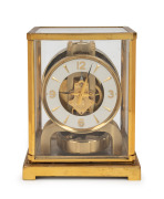 JAEGER LECOULTRE "Atmos" Swiss made clock in original brass lacquered four glass case, skeletonised movement with Arabic and baton hour&nbsp;mark chapter ring, circa 1950, with original manufacturer's "Repair Notes" handbook, 22.5cm high, 18cm high, 13.5cm dee