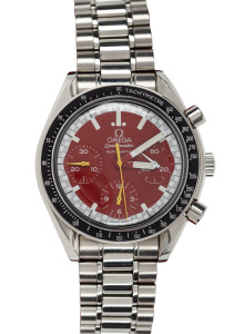 OMEGA "Speedmaster" gents automatic wristwatch with red dial and three subsidiary dials, in stainless steel case with original buckle and bracelet, housed in an Omega box, 4.1cm wide including crown