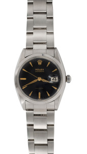 ROLEX "Oysterdate" gents wristwatch with manual movement, black dial with gold baton numerals and original bracelet and clasp, housed in original box with papers and wax seal, near mint condition, 3.9cm wide including crown