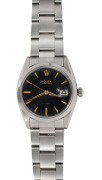 ROLEX "Oysterdate" gents wristwatch with manual movement, black dial with gold baton numerals and original bracelet and clasp, housed in original box with papers and wax seal, near mint condition, 3.9cm wide including crown