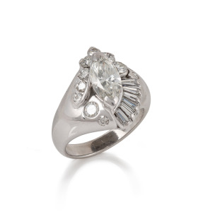 An 18ct white gold and diamond cluster ring, central marquise cut diamond approximately 1.12ct, surrounded by brilliant and baguette cut diamonds, with insurance valuation document ($18,350), 8 grams total.