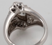 An 18ct white gold and diamond cluster ring, central marquise cut diamond approximately 1.12ct, surrounded by brilliant&nbsp;and baguette cut diamonds, with insurance valuation document ($18,350), 8 grams total. - 3