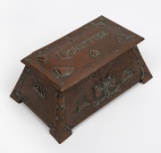 An Arts & Crafts hand-made copper cigarette box with cedar lining, early 20th century, ​​​​​​​11cm high, 25cm wide, 15cm deep.