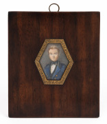 A miniature portrait of a gentleman in a blue overcoat, hand-painted on ivory in hexagonal gilt metal mount and timber frame, 19th century, ​​​​​​​11.5 x 10cm