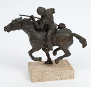 In the style of FREDERIC REMINGTON cast bronze statue of a horse and rider, late 20th century, 23cm high overall. - 2