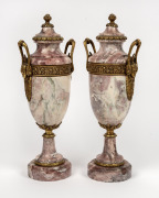 A pair of French rose marble and ormolu mantle urns, 19th century, 41cm high