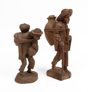 Two South American carved wooden statues, one signed "Industrias Rae", 31cm and 24cm high&nbsp;