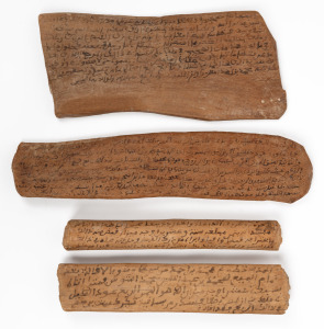 PERSIA: A group of four wooden blessing gifts bearing prayers, blessings and invoking God and Mohammad's intervention for good health, happiness or safe arrival, dates appear to be circa 1750-1800, the largest 26cm long, 6cm wide
