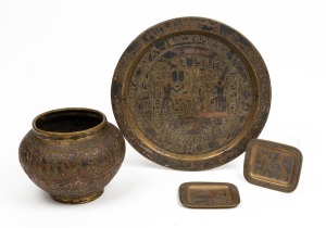 Egyptian brass tray, jardiniere and two dishes, inlaid with silver and copper work, 19th/20th century, (4 items), the tray 35cm diameter