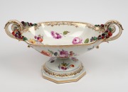 A German floral porcelain table centrepiece with applied fruit and gilt decoration, 19th/20th century, 20cm high, 40cm wide