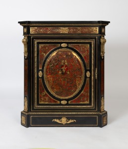 An antique French boulle single door pier cabinet with ormolu mounts and later Belgian black slate top, 19th century, retailed by Edwards & Roberts, Wardour Street, London, (stamped to the top edge of the door), 110cm high, 98cm wide, 44cm deep