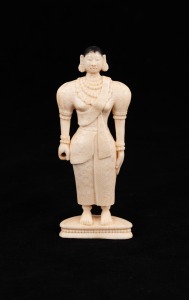 A Laotian carved ivory statue of a lady, early to mid 20th century, (would have originally been holding an object which is no longer present), 12cm high