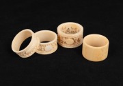 Three antique Chinese carved ivory napkin rings; together with a carved whalebone example, 19th/20th century, (4 items), the largest 4.5cm diameter