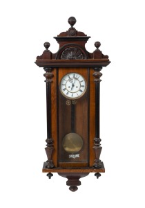 An antique Vienna regulator twin weight wall clock in walnut case, 19th century, 122cm high