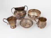 Antique English sterling silver christening mug, cream jug, sugar basin, pierced dish and finger bowl, 19th/20th century, (5 items), the largest 12cm high, 578 grams total.