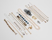 Assorted costume jewellery, replica wristwatch, fine 9ct gold chain and a 9ct gold pendant, (qty)