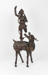 A Chinese bronze two piece statue of a demon and mythical animal, 19th/20th century, ​​​​​​​81cm high
