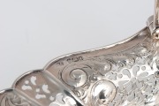 An antique English sterling silver pierced bread basket, made by Atkin Brothers of Sheffield, circa 1893, 22cm high including handle, 31cm wide, 546 grams - 2