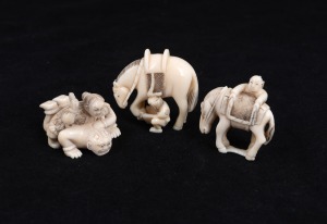 Three Japanese carved ivory netsuke comprising of&nbsp;two figural groups with horses and the other of a lady wrestling a demon, mid 20th century, the largest 4.5cm high