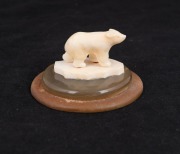 An Inuit carved marine ivory polar bear statue mounted on horn plinth, 20th century, 4cm high, 7cm diameter - 2