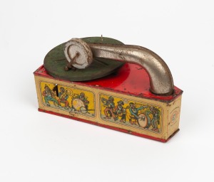 A vintage tin-plate clockwork toy gramophone, ​​​​​​​14cm high, 25cm long overall