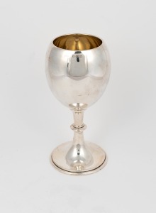 An English sterling silver chalice with gilt wash interior, stamped "C. Bros. Ltd." of Birmingham, circa 1905, 21cm high, 319 grams