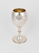 An English sterling silver chalice with gilt wash interior, stamped "C. Bros. Ltd." of Birmingham, circa 1905, 21cm high, 319 grams