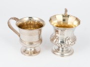 A Georgian sterling silver christening mug; together with an antique English sterling silver christening mug with lizard handle, 18th/19th century, (2 items), 8cm and 9.5cm high, 212 grams total - 2