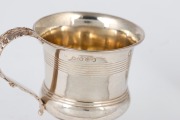 A Georgian sterling silver christening mug; together with an antique English sterling silver christening mug with lizard handle, 18th/19th century, (2 items), 8cm and 9.5cm high, 212 grams total - 4