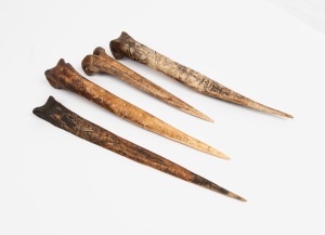 Four tribal bone daggers with carved decoration, Papua New Guinea origin, ​​​​​​​the largest 36cm long