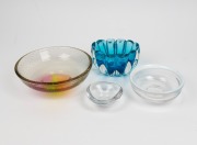 A blue Murano glass bowl, a Swedish clear glass bowl with white rim, an Orrefors Swedish tri-form glass bowl and an art glass bowl with bubble inclusions, (4 items), the largest 21cm diameter