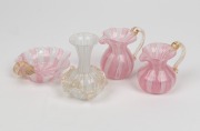 Four pieces of vintage Murano latticino glassware, comprising of two pink jugs, a pink dish and a white vase, 20th century, the vase 9cm high