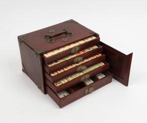 An antique Chinese bone and bamboo Mah Jong set in original timber case with brass fittings, (missing top section of sliding lid), early 20th century, the&nbsp;box 24cm wide