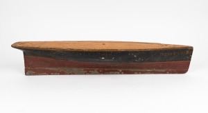 A vintage model boat hull with painted finish, titled "The Mystery", 20th century, 68cm long