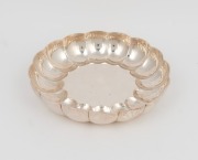 A vintage English sterling silver lotus shaped bowl, 20th century, 4cm high, 20.5cm wide, 518 grams