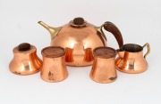 An Italian copper and brass tea service with&nbsp;wooden handles and matching pair of condiments, 20th century, (5 items), the teapot 12cm high, 27cm wide