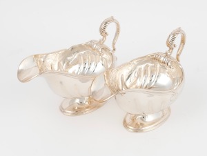 65 · A pair of antique English sterling silver sauce boats by Atkin Brothers of Sheffield, circa 1905, 14cm high, 18cm long, 725 grams total
