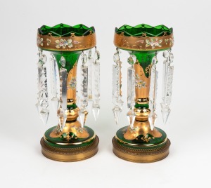 A pair of Bohemian green glass lustre lamps&nbsp;with enamel and gilt overlay, gilt metal bases and crystal drops, 20th century, 33cm high
