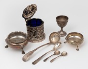 Two antique sterling silver salts, a sterling silver jam pot, a French silver egg cup, a Scottish sterling silver sauce ladle, two sterling silver salt spoons, and a sterling silver mustard spoon, 19th/20th century, (8 items), the ladle 16cm long, 358 gra