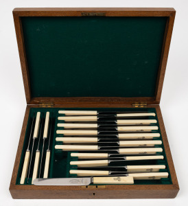 A set of 12 antique bone handled knives in two sizes, each adorned with engraved monogram, housed in a fitted oak canteen, 19th century, the canteen 35.5cm wide.