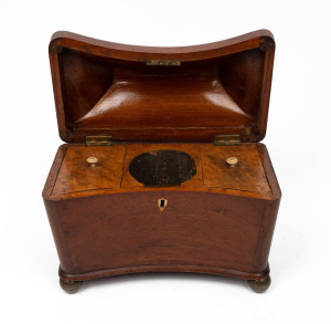 An antique mahogany tea caddy with unusual convex curved front, interior fitted with compartments finished in maple, 19th century, 21cm high, 29cm wide, 16cm deep.