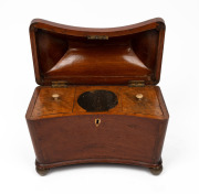 An antique mahogany tea caddy with unusual convex curved front, interior fitted with compartments finished in maple, 19th century, ​​​​​​​21cm high, 29cm wide, 16cm deep.