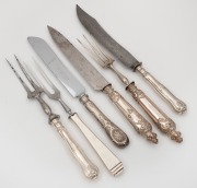 Six assorted antique and vintage silver handled carving implements, 19th/20th century, the largest 33cm long