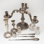 Two sterling silver candlesticks (weighted bases), sterling silver lace hooks, condiments and vanity jar, plus a silver plated candelabra, 19th/20th century, (10 items), the candelabra ​​​​​​​27cm high, 34cm wide.