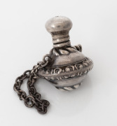 An antique English sterling silver miniature scent bottle with chatelaine chain, made in Birmingham, circa 1901, 6cm high including chain