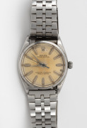 ROLEX "Oyster Perpetual" gents wristwatch in stainless case with automatic movement and baton numerals, housed in a Rolex box, 3.5cm wide including crown