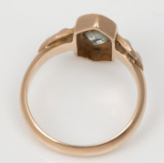 An antique 15ct gold ring, set with an aquamarine, two diamonds and flanked by three seed pearls on each shoulder, circa 1900, stamped "15ct", 4.5 grams total - 2